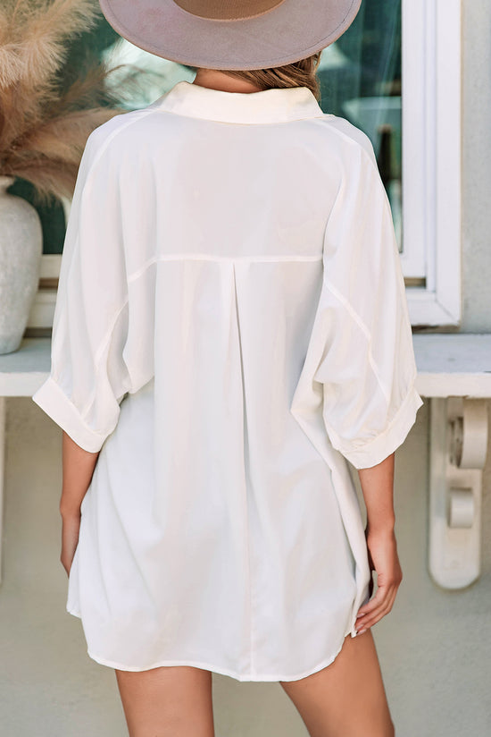 Oversize white shirt with 3/4 puffing sleeves