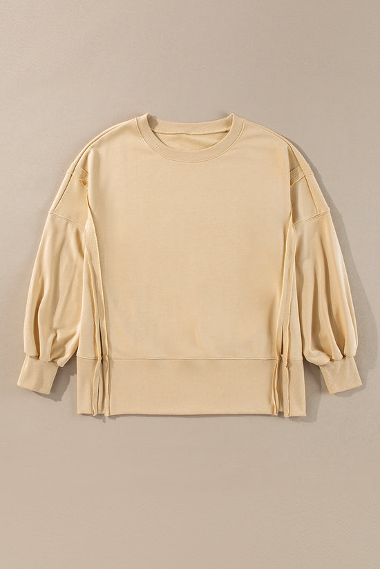 Light French beige beige sweatshirt, drooping shoulders, round neck and slits