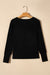 Black ribbed top with bishop sleeves and round neck