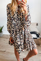 Black dress with leopard buttoned print on the front, 3/4 sleeves and ruffle hem