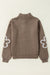 Half-zip mock neck sweater with contrasting parchment flowers