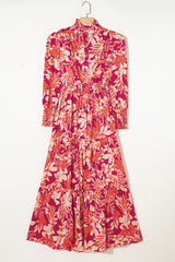 Robe longue taille haute smockée boutonnée à imprimé floral rose