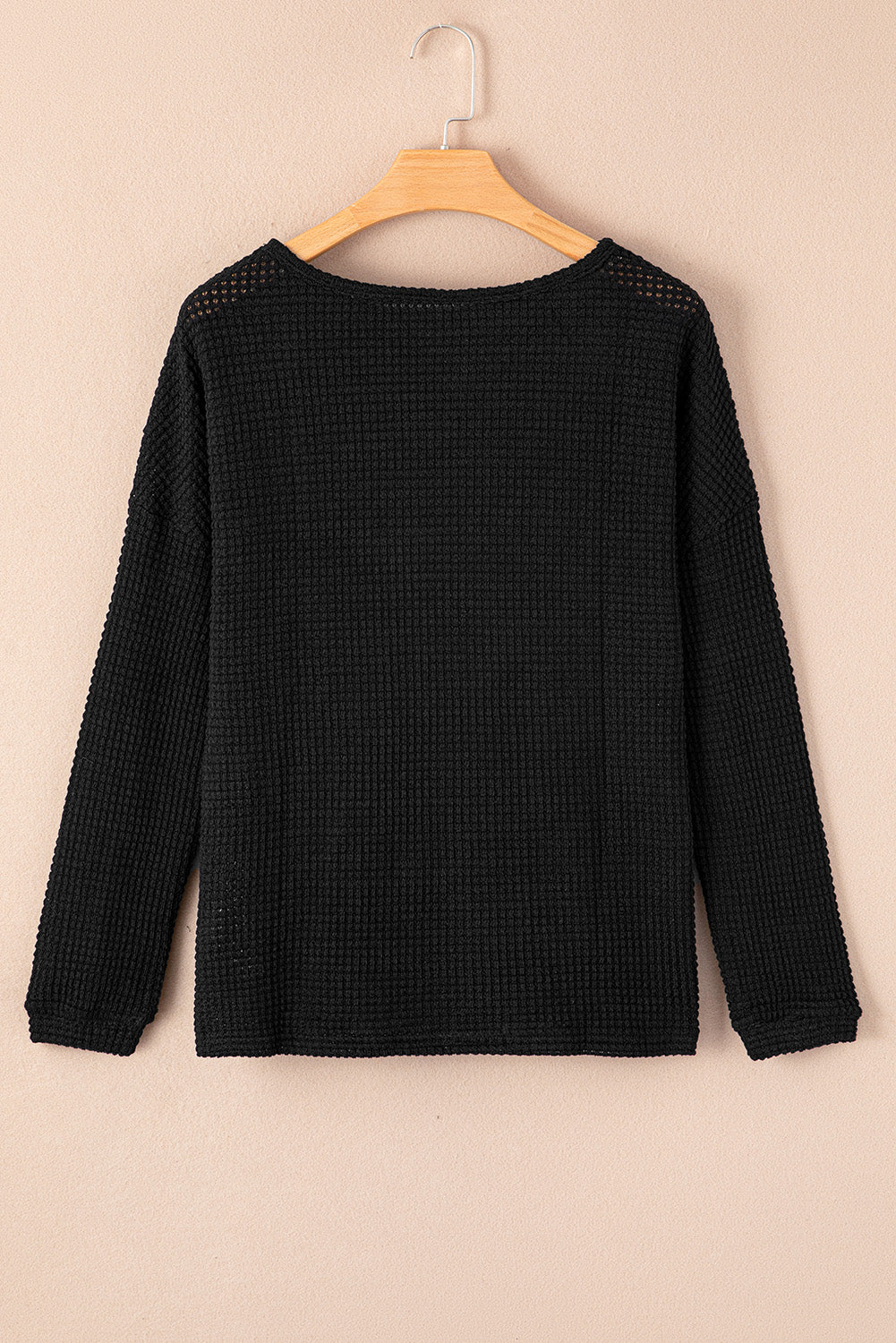 Black high with long sleeves and drooping shoulders *