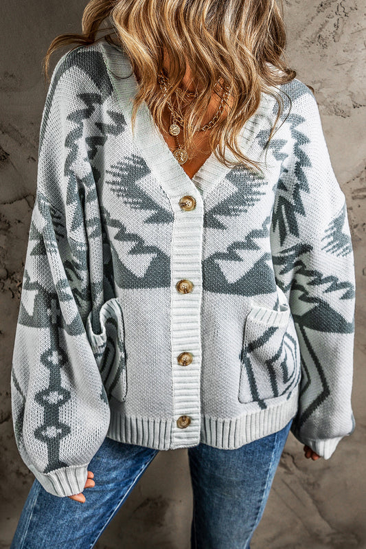 Light gray button-down cardigan with geometric pattern and ribbed trim