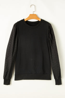 Plain black sweatshirt with patchwork sleeves and round neck