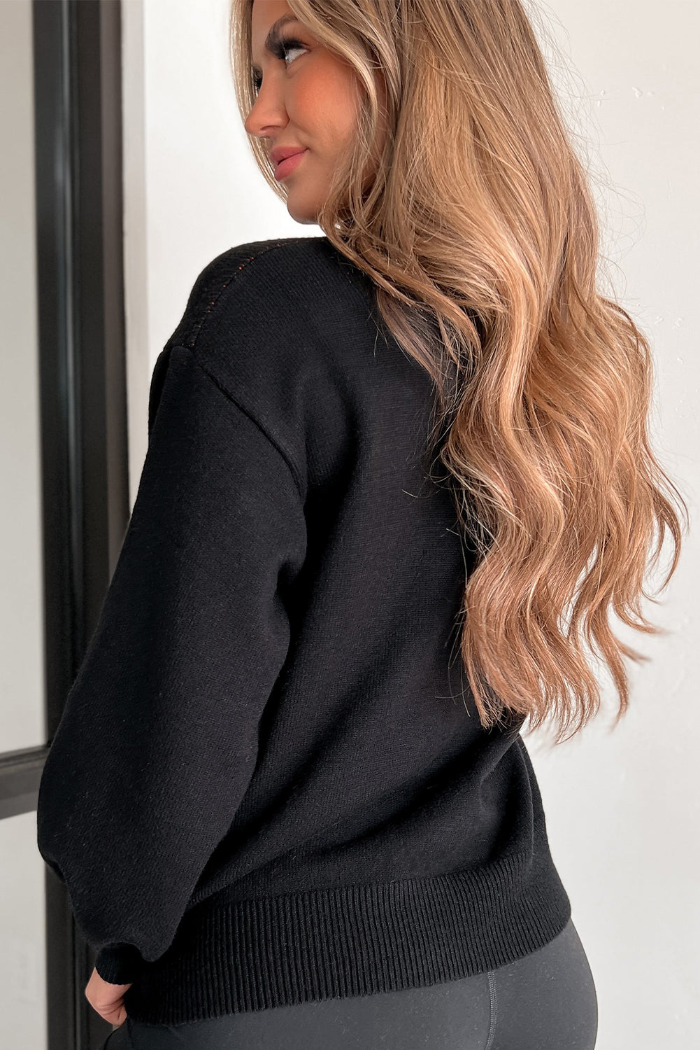 Black shoulder sweater and Halloween pumpkin face pattern