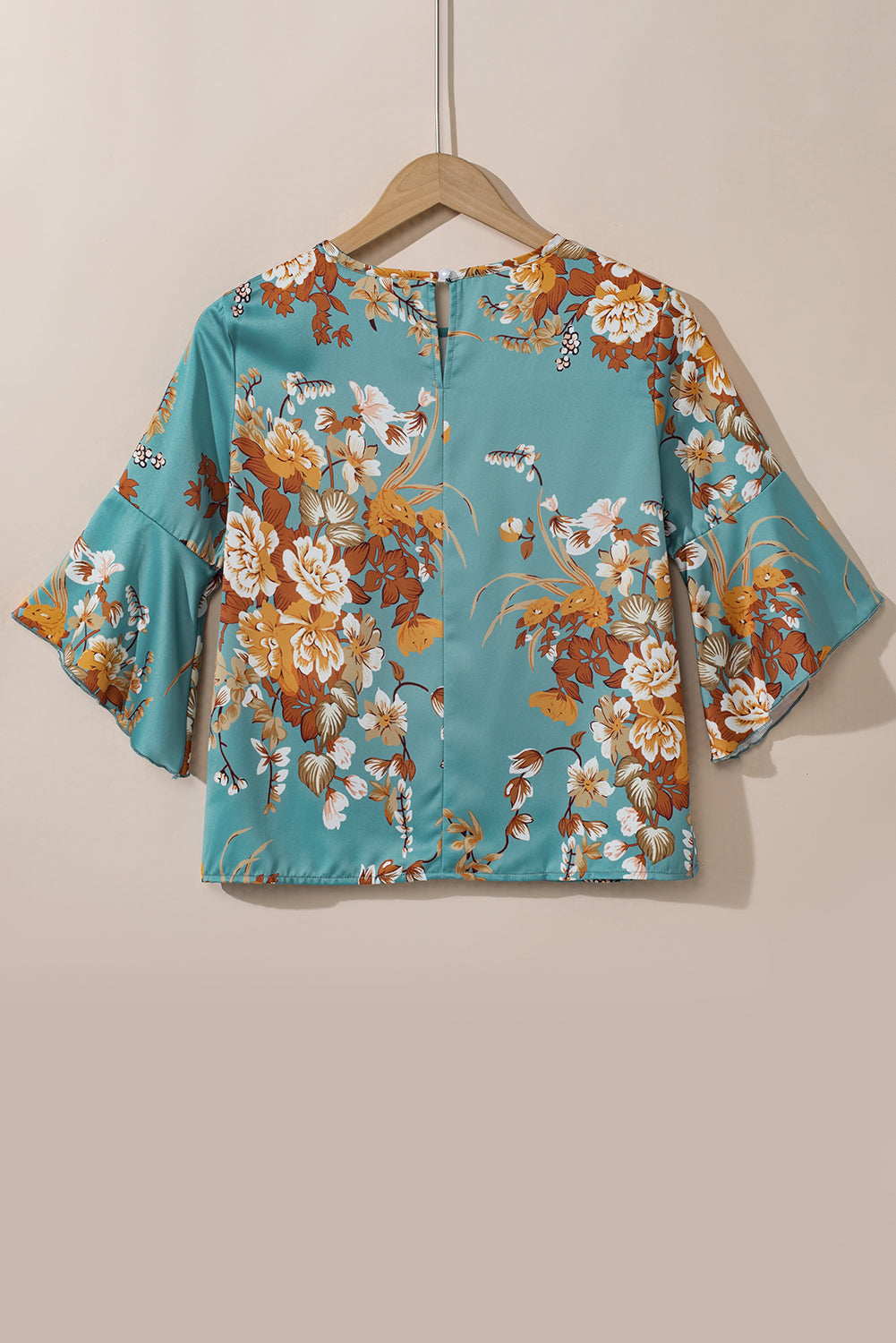 Blusa floral de manga de bengala azul mineral