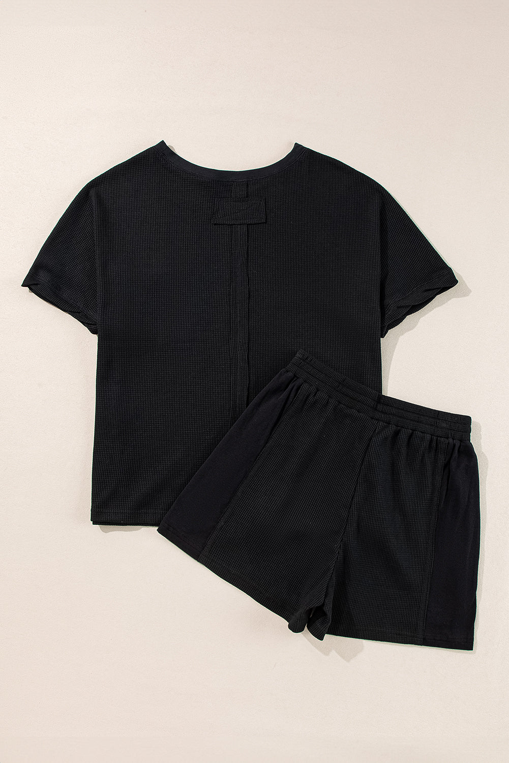 Ensemble t-shirt et short oversize en tricot gaufré noir-A WOMAN WE LOVE