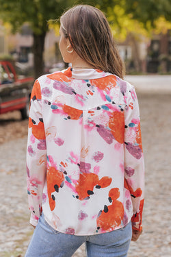 Long sleeve buttoned shirt and multicolored abstract print