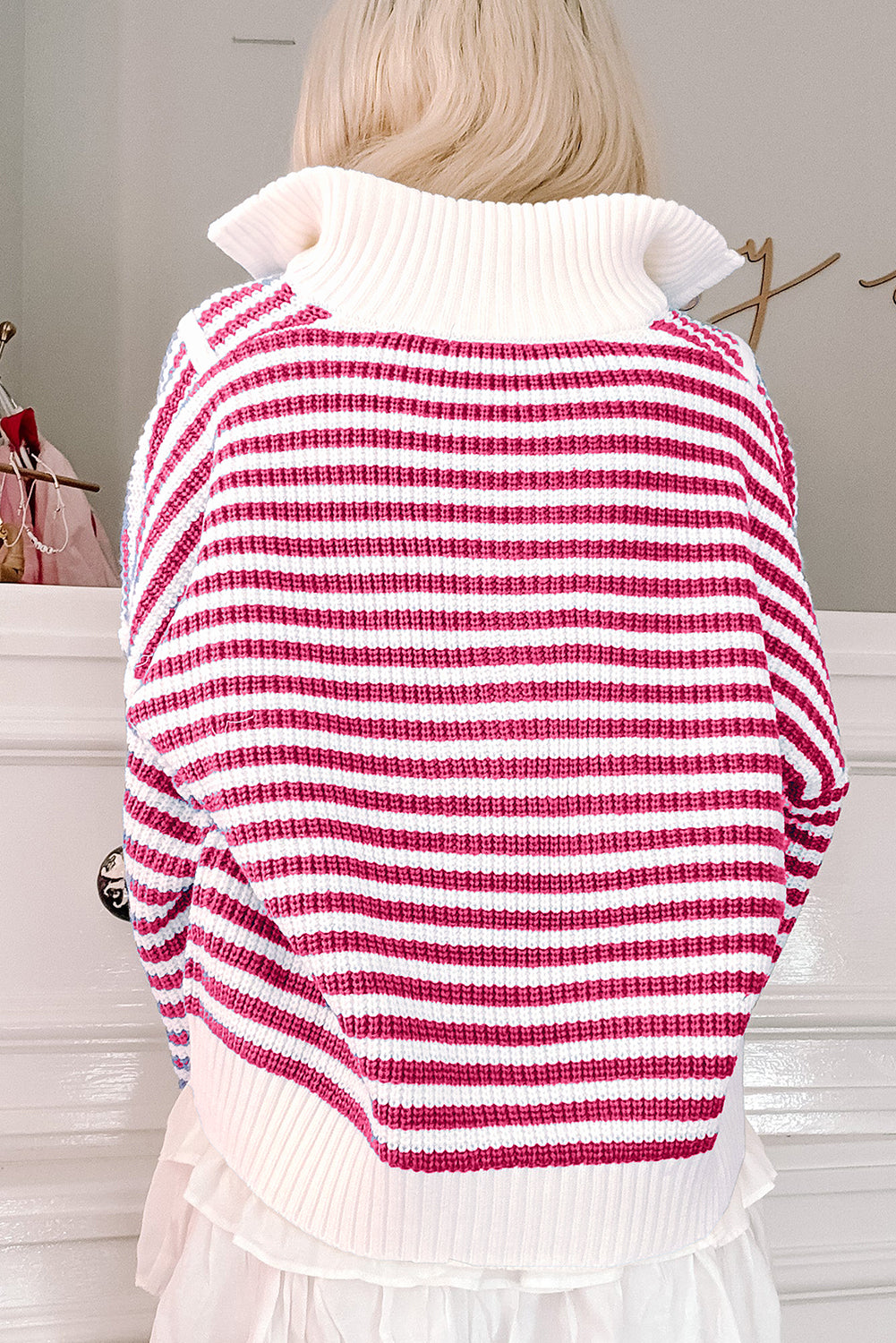 Pink striped sweater, zipped collar, dropped shoulders