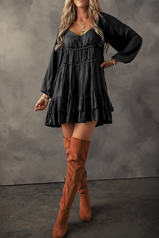 Black mini-ruffle with ruffles and puffy sleeves, loose cut