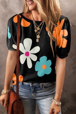 Camiseta negra con burbujas y estampados florales *