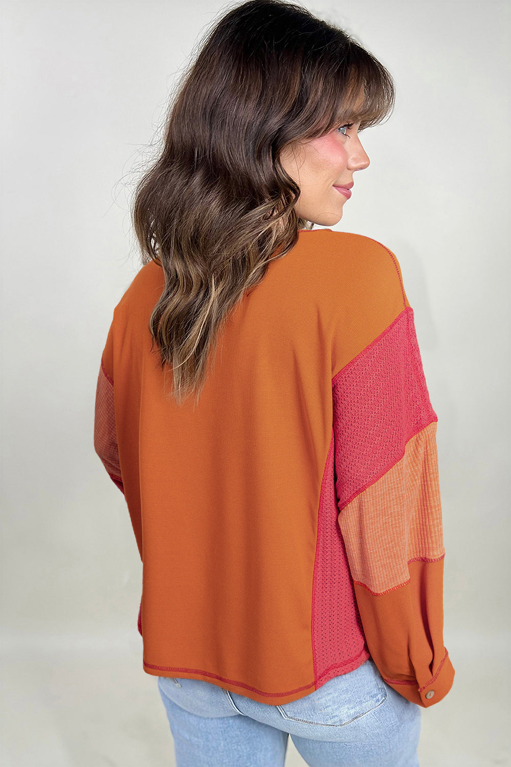 Haut orange en tricot texturé avec bloc de couleurs *