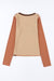 Brown ribbed knit top with exposed seams and color blocking