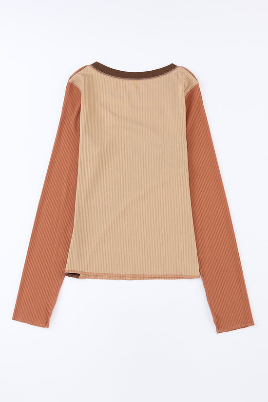 Brown ribbed knit top with exposed seams and color blocking