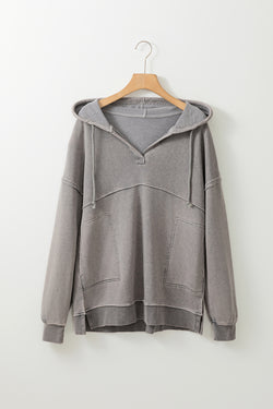 Grey mineral wash hoodie with exposed stitching