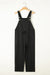 Black short overalls with buttoned straps and drawstring