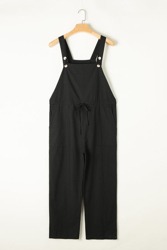 Black short overalls with buttoned straps and drawstring