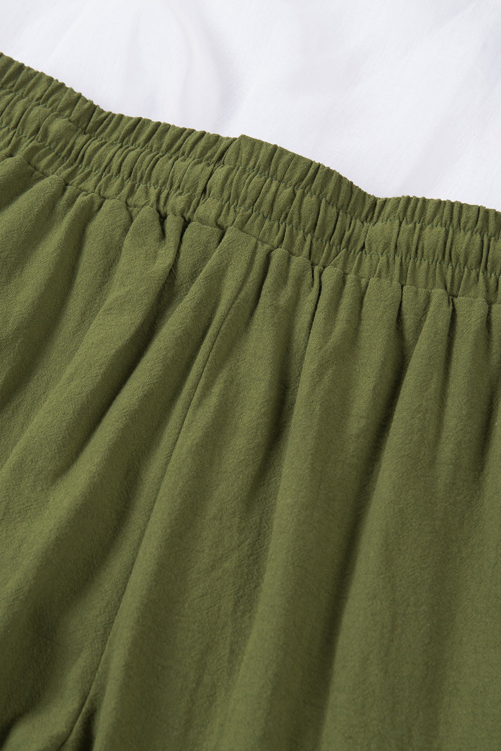 Pantalones bolsillos con cordón elástico en la cintura perneras largas y rectas verde