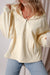 Beige loose hoodie with kangaroo pockets and semi-ferms flash lined with fleece