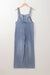 Large overalls in a washed-out denim blue stone with half-boutons and pocket pocket