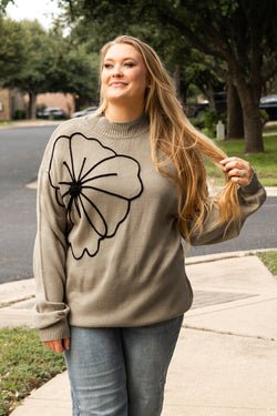 Plus size dark khaki sweater with large flower pattern, high neck, dropped shoulders