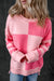 Large pink sweater for a low -low striped color block