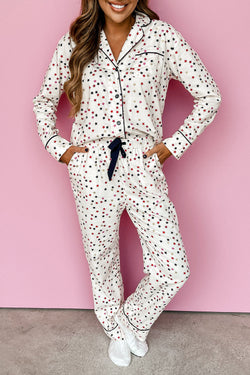 Pajama blanco con mangas largas y pantalones con contrastes y tuberías de estrellas