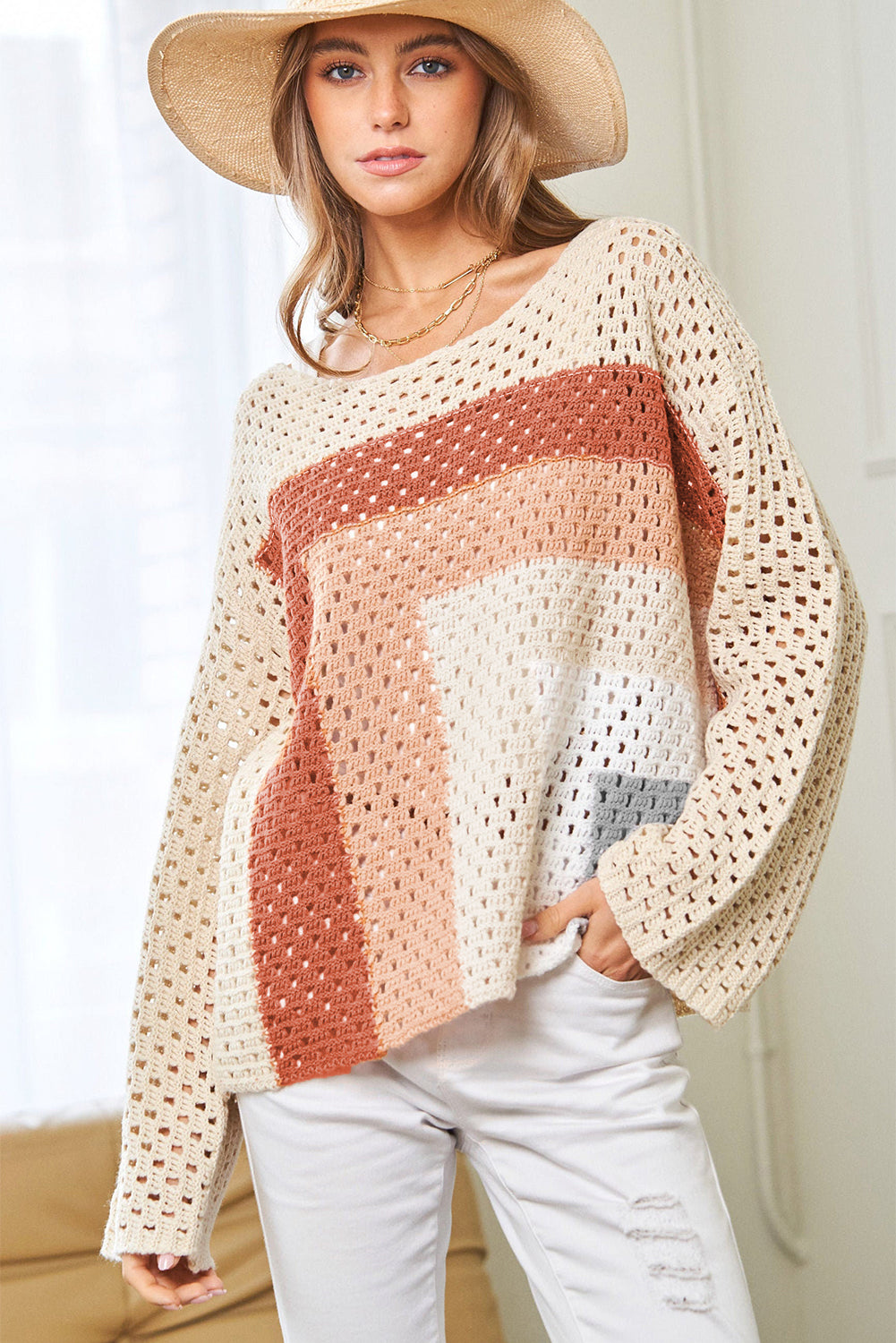 Pull ample en tricot pointelle abricot color block