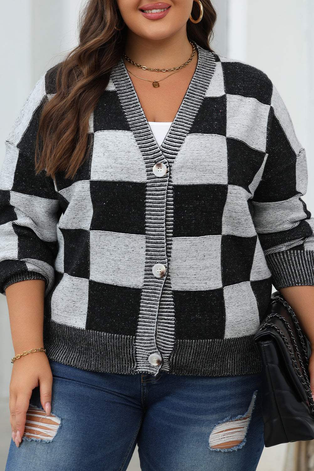 Cardigan noir à carreaux et épaules tombantes boutonné à col en V-A WOMAN WE LOVE