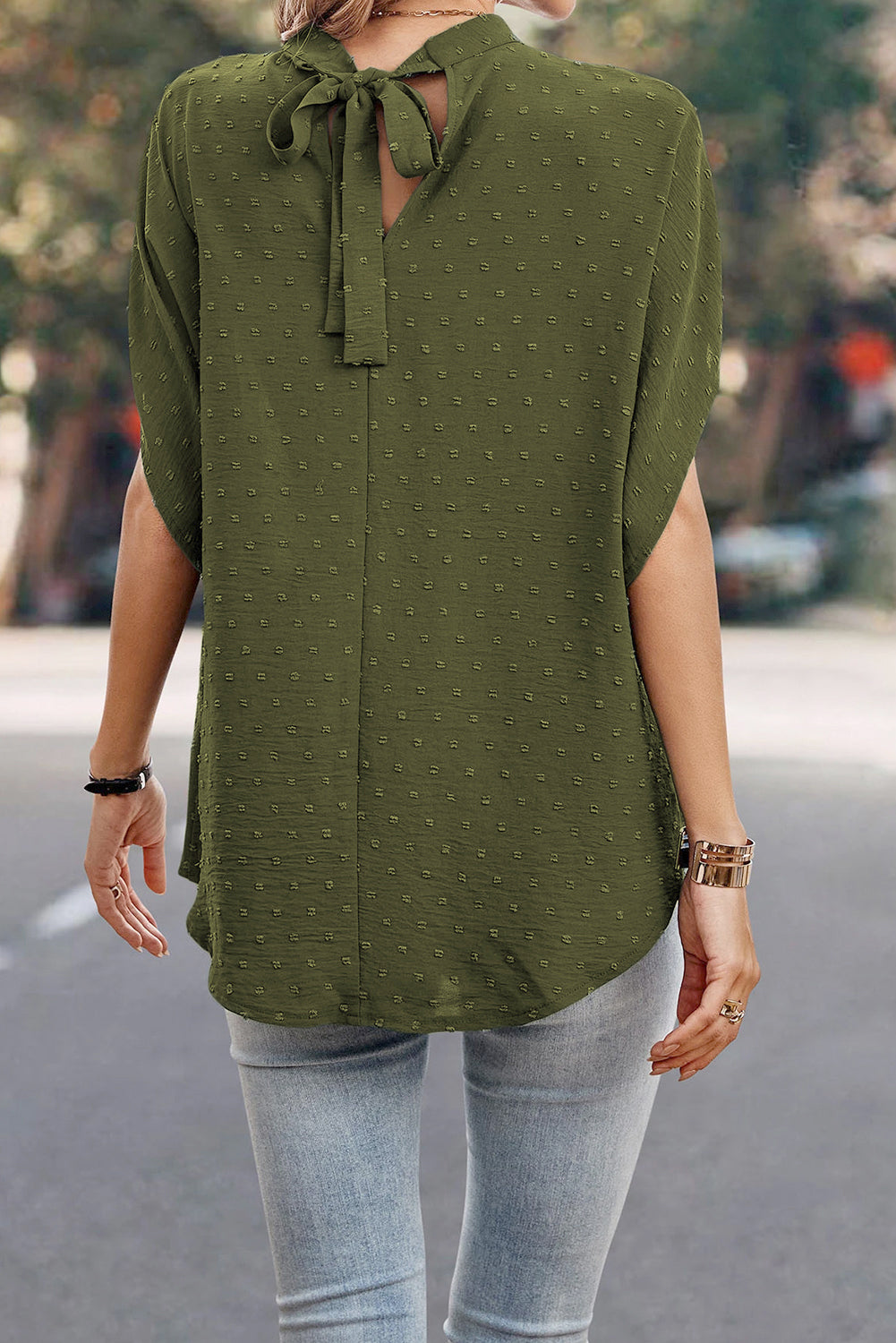 Blouse vert brume à pois suisses, col montant, manches chauve-souris-A WOMAN WE LOVE