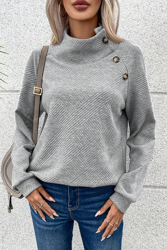 Grey textured sweatshirt with mock neck and asymmetrical buttons