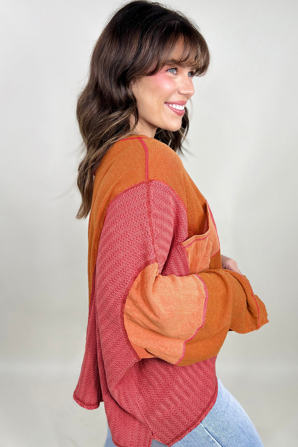 Haut orange en tricot texturé avec bloc de couleurs et poche poitrine en patchwork de grande taille