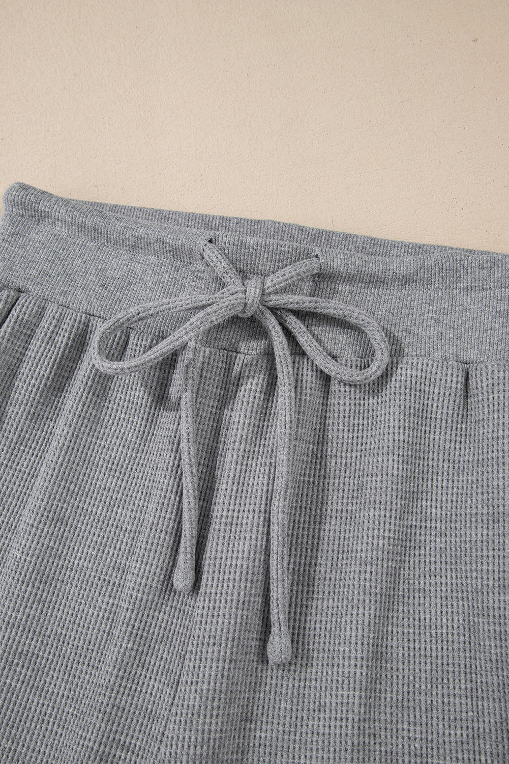 Pantalones de pierna ancha y cintura alta con cordón de punto gofre gris