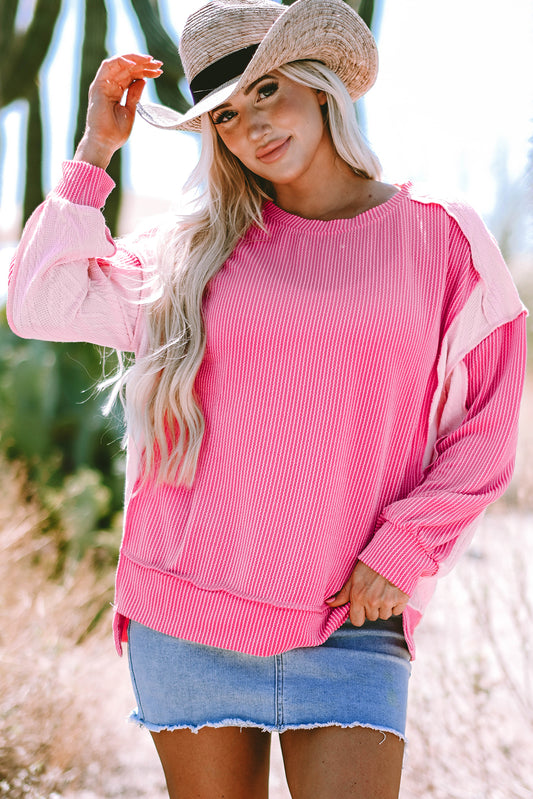 Cable Bonbon Knit Colorblock Sweinshirt expuesta de costura