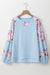 Beau Blue - Textured blouse with balloon sleeves and floral patchwork