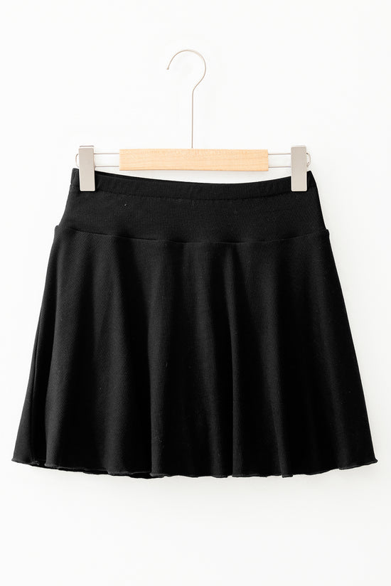 Jupe-short trapèze noire taille haute drapée *