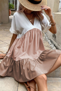 Large dress on several levels, light French beige, triple colors, V -neck, folded wrists