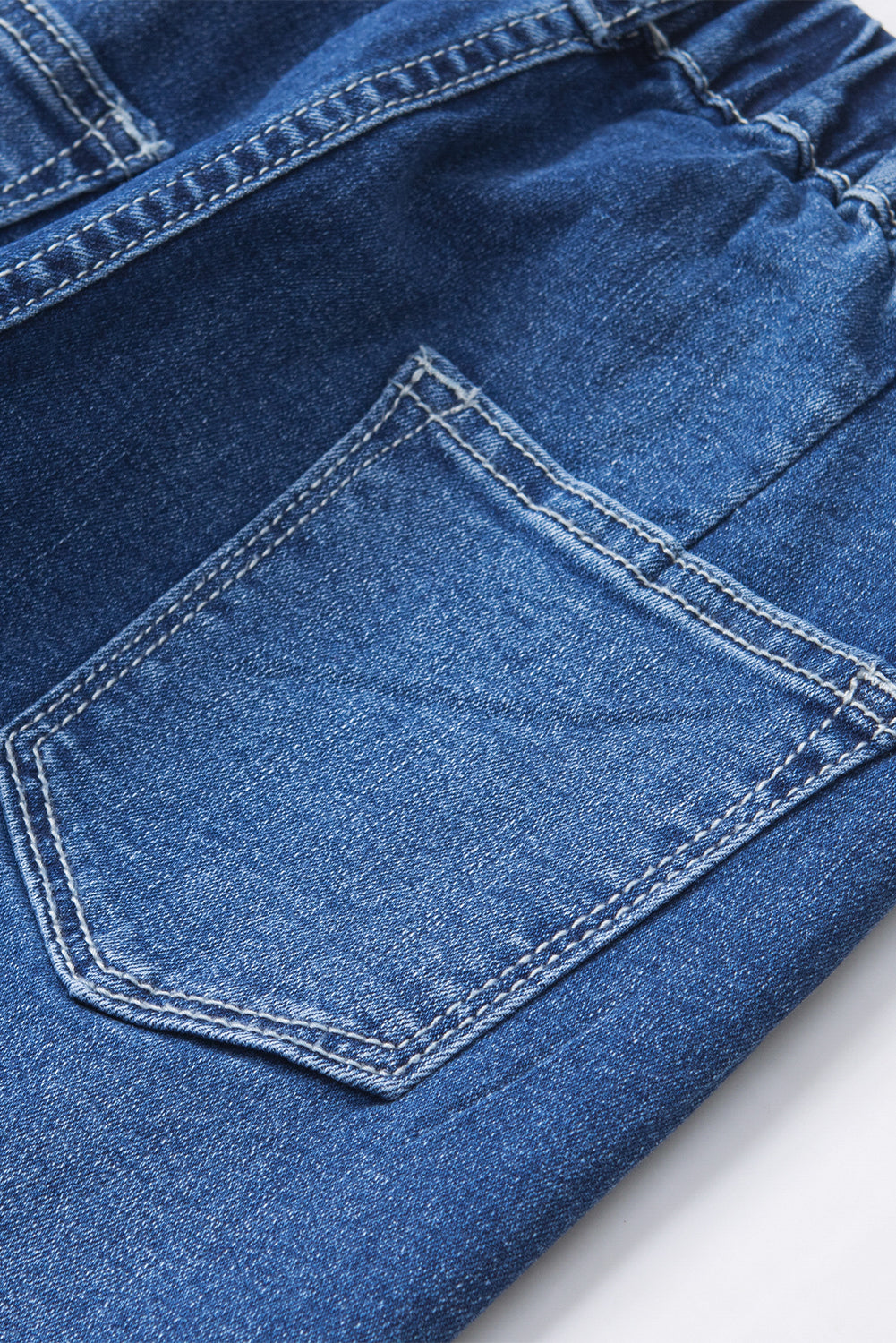 Jeans a bagliore a vita alta elastica blu