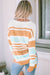 Fended sleeve sweater and multicolored color block stripes