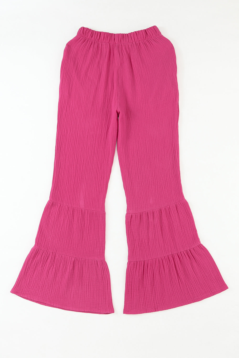 Pantalones acampanados con volantes y cintura alta con textura rosa