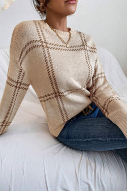 Khaki sweater with falling knitted shoulders with Scottish pattern