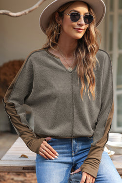 Brown top with thumbhole sleeves and contrasting patchwork