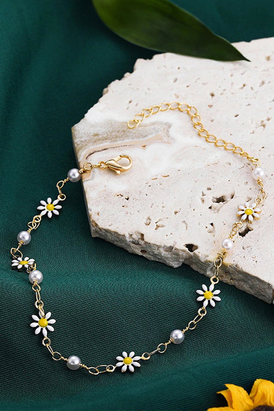 Bracelet de cheville chaîne en marguerite et perles dorées