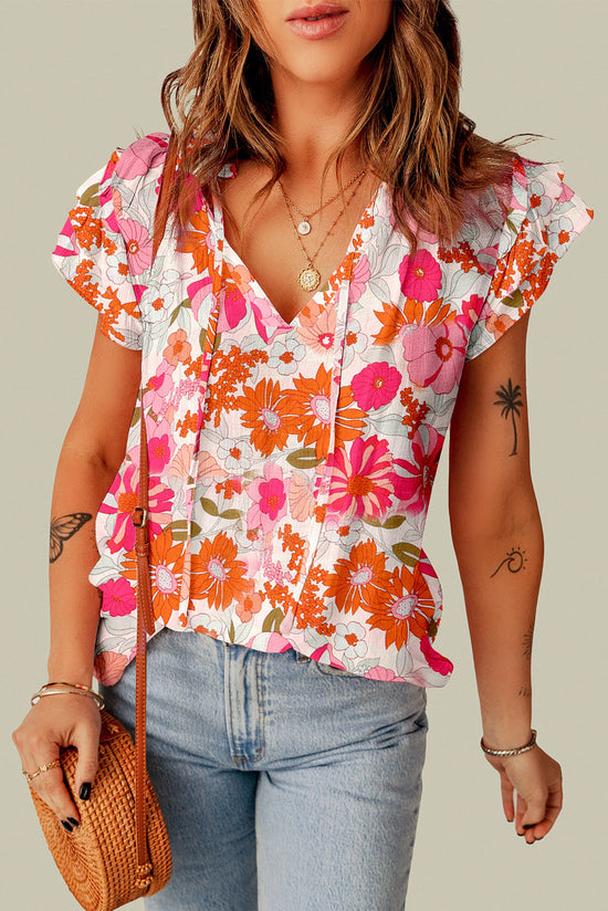 Blouse florale multicolore fendue à col en V et manches à volants