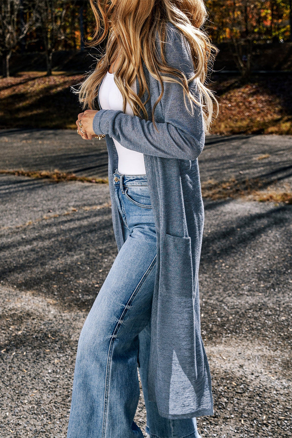 Cardigan long ouvert sur le devant avec poches en tricot flammé bleu