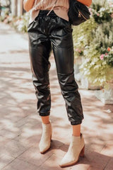 Pantalones de trote negros en tamaño simocked y cordón de apriete