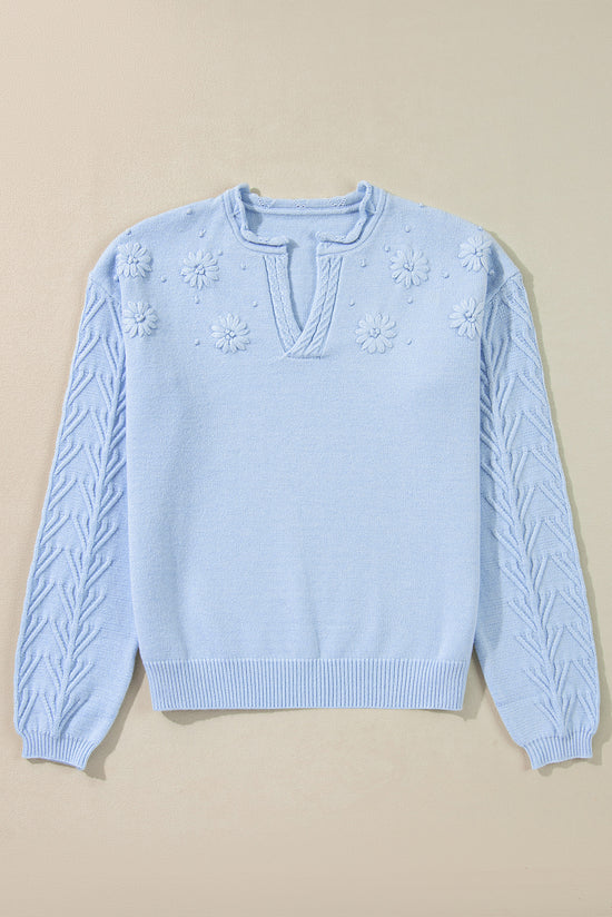 Knitted sweater with notched neck and flower details *