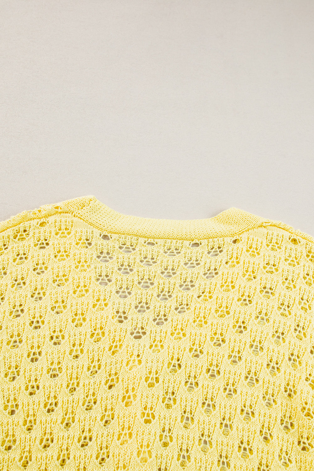 Cardigan pull jaune en maille pointelle à col en V