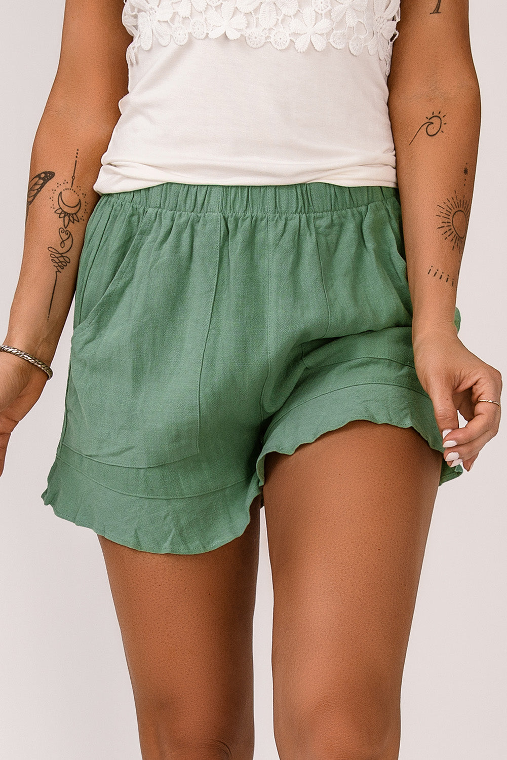 Green high waisted ruffled pocket shorts